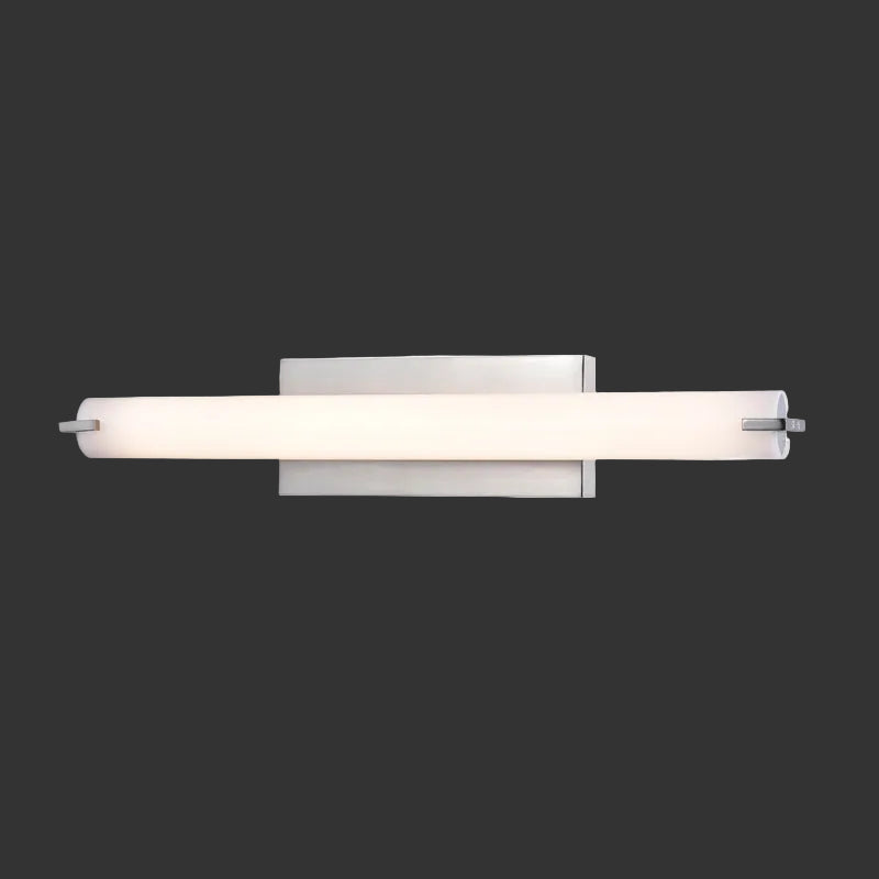 Modern wall-mounted light fixture with two cylindrical glass shades on a white background